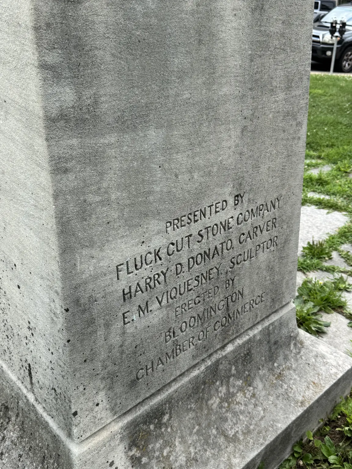 Pedestal inscription crediting Harry D. Donato as carver of The Spirit of the Fighting Yank